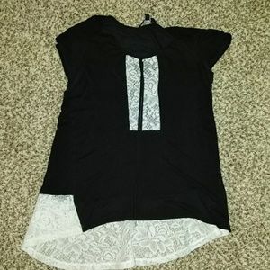 It's a black and white blouse